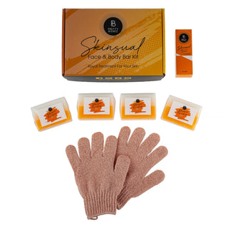 Complete Skinsual Face & Body Bar Kit with four soap options, exfoliating gloves, and a Vitamin C serum for targeted skin lightening and daily care.